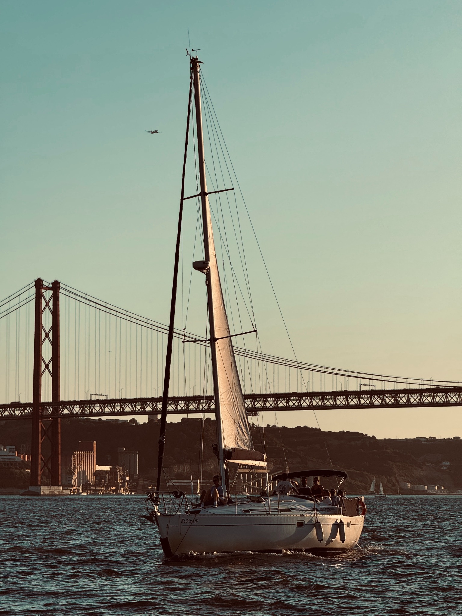 Our sailing boat on the Tagus, with Lisbon’s 25 de Abril Bridge behind it